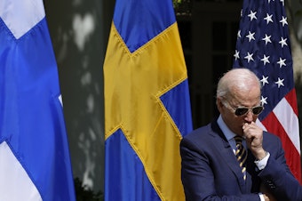 caption: Joe Biden listens to remarks by Finland's President Sauli Niinisto and Sweden's Prime Minister Magdalena Andersson at the White House this week.