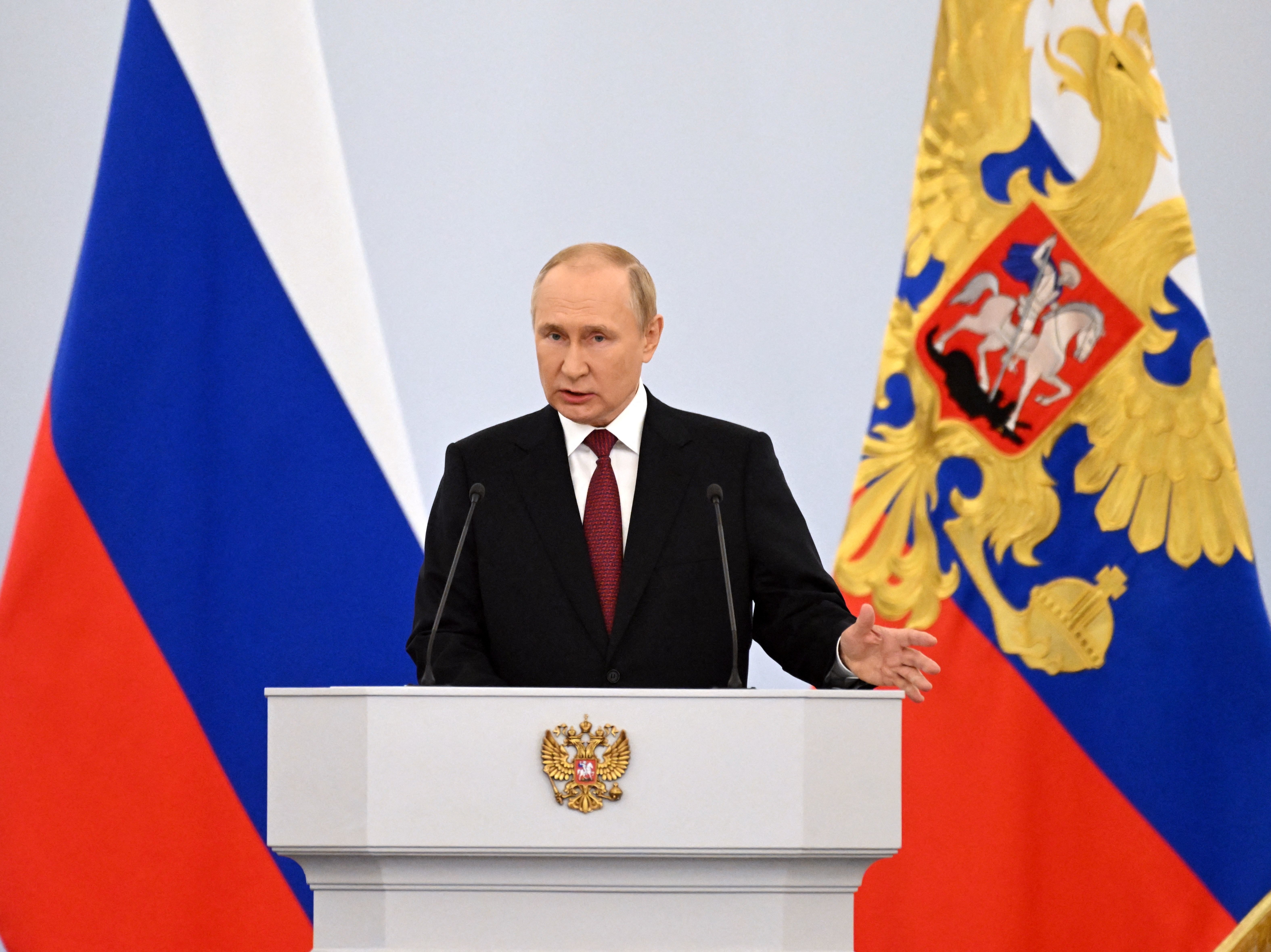 caption: Russian President Vladimir Putin gives a speech during a ceremony formally annexing four regions of Ukraine Russian troops occupy, at the Kremlin in Moscow on Friday.
