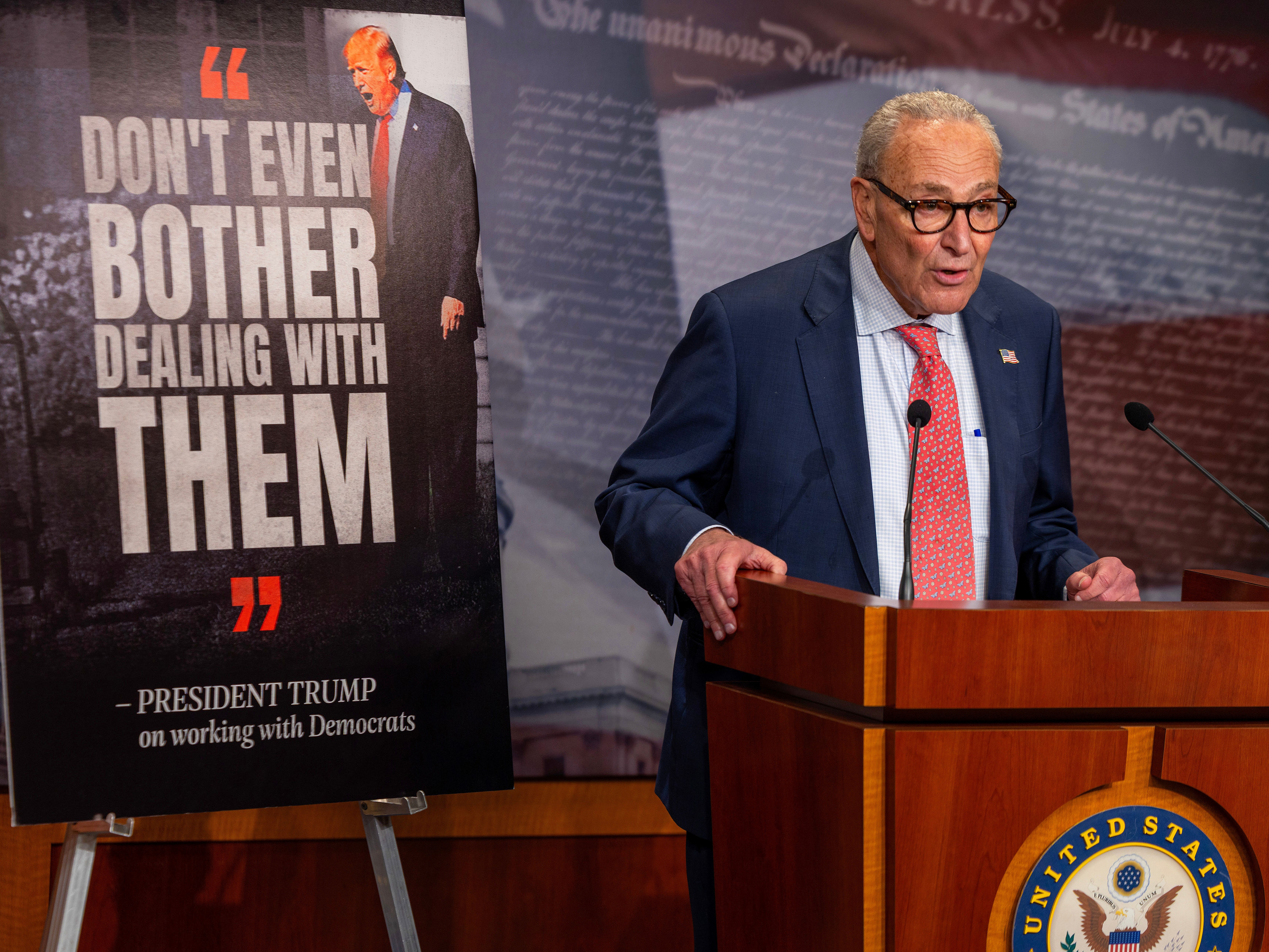 caption: Senate Minority Leader Chuck Schumer, D-N.Y.,  speaks to media during a press conference at the U.S. Capitol on Sept. 19 in Washington, D.C. Schumer, along with other top congressional leadership, will meet with President Trump on Monday ahead of a government shutdown.