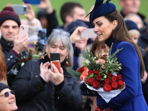 caption: Kate, Princess of Wales, says she edited a photo that seemed to promise to ease concerns about her health — but only raised new questions. She's seen here greeting the public on Christmas Day, last December.