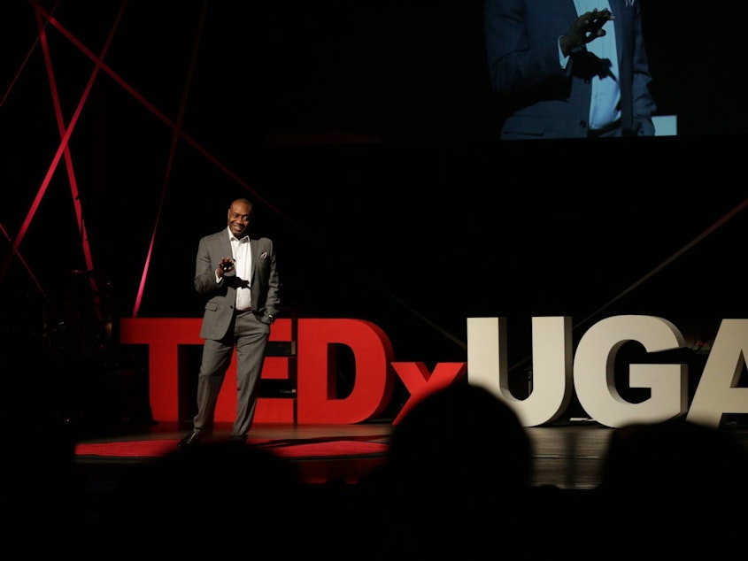 caption: J. Marshall Shepherd on the TED stage.