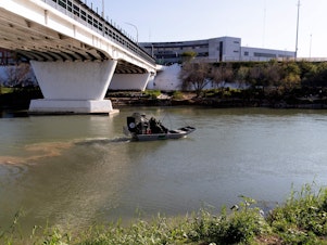 caption: An airboat from the South Border Patrol Station in Laredo, Texas, leaves to patrol the Rio Grande River near the Laredo checkpoint.