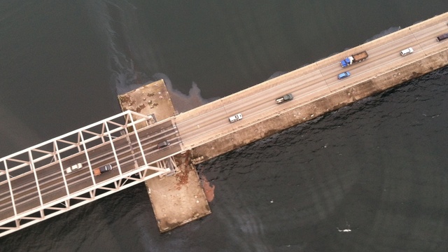 caption:  A flyover by the Washington Department of Ecology yielded this photo of Monday's spill at Hood Canal Bridge. The spill, traveled 10 miles from Naval Base Kitsap-Bangor.