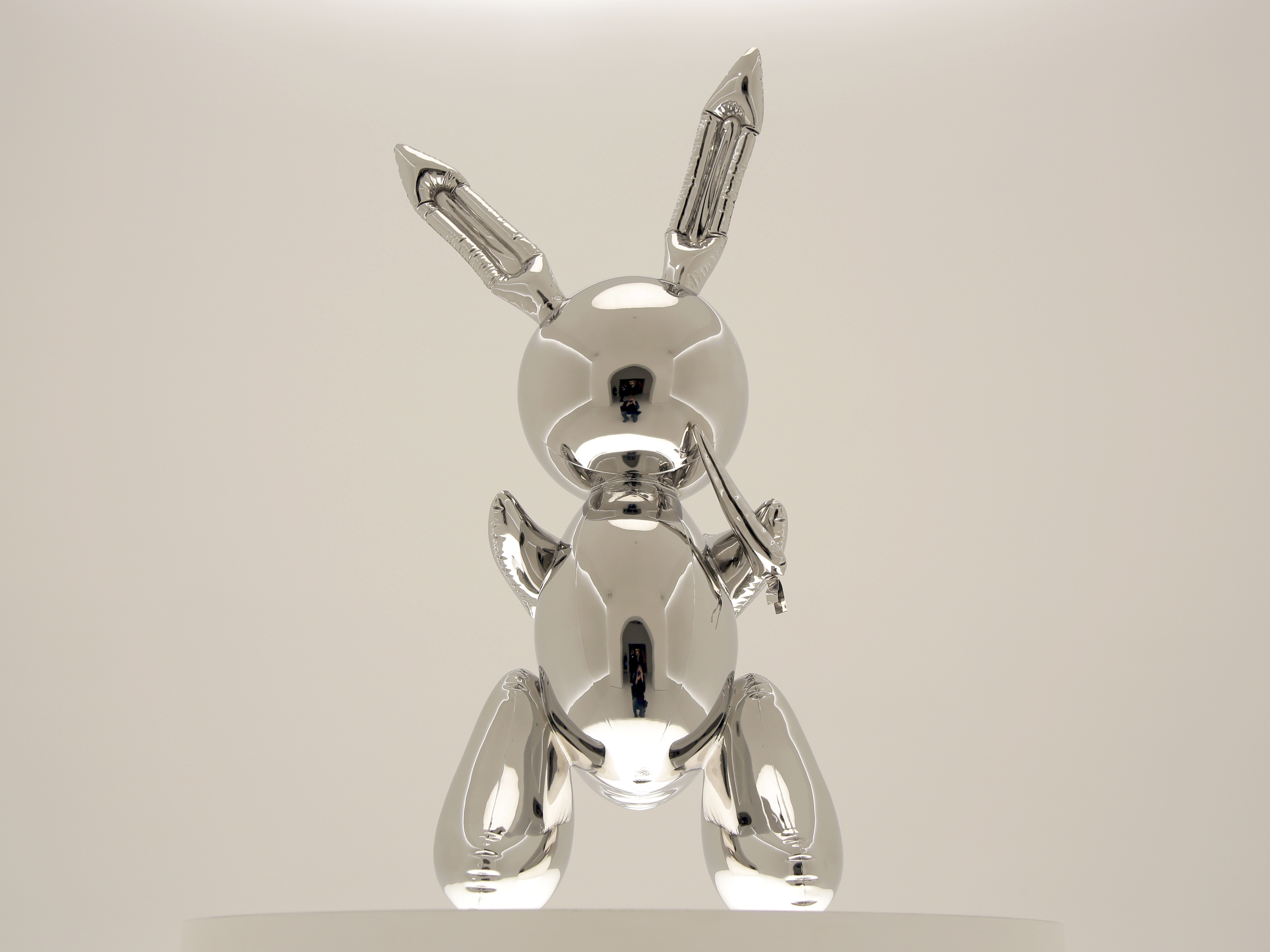 caption: <em>Rabbit</em> by Jeff Koons was sold for more than $91 million at Christie's in New York on Wednesday night. It set a record for the most expensive work by a living artist to be sold at auction.