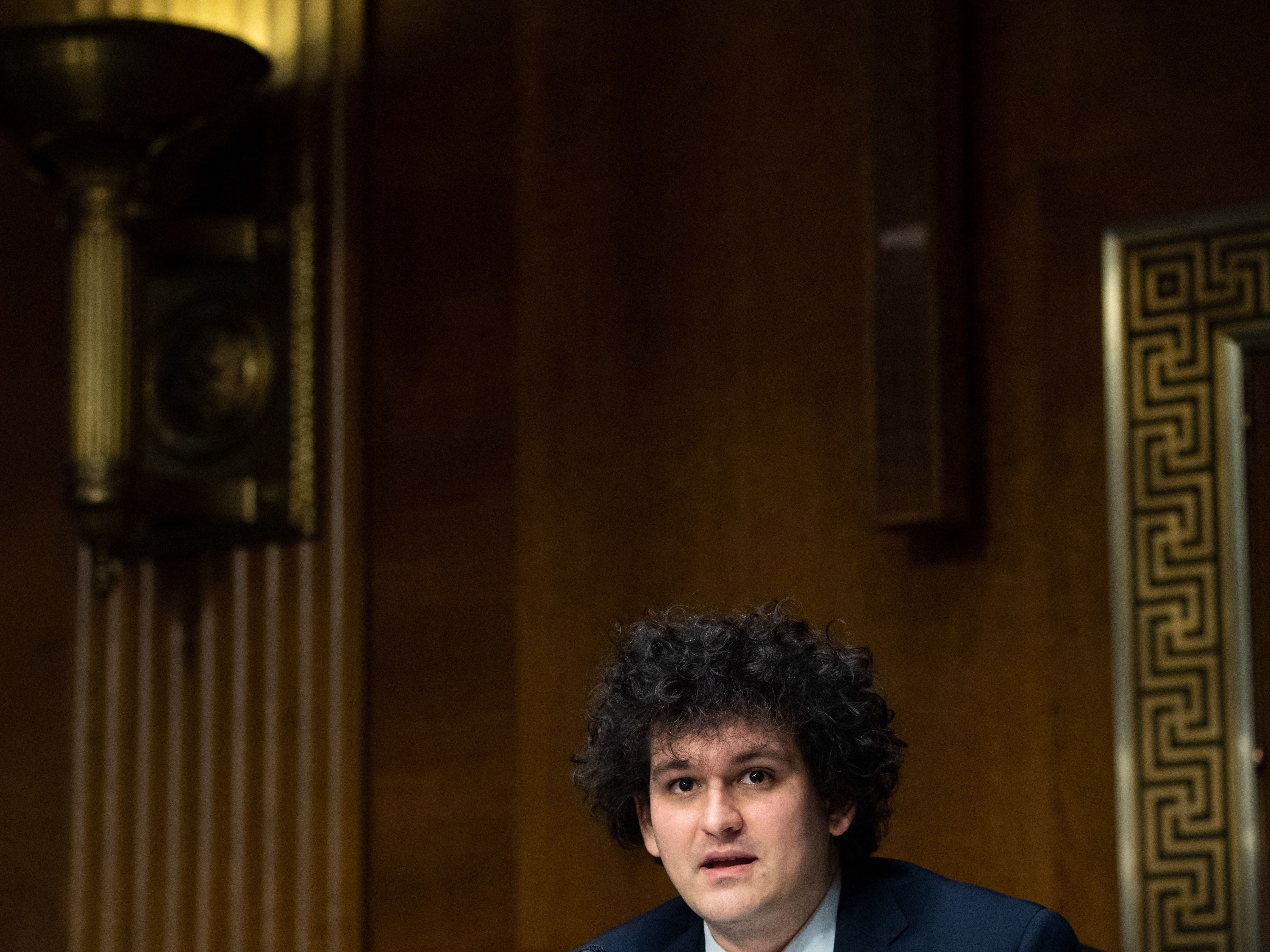 caption: As FTX collapsed in early November, Samuel Bankman-Fried handed over control the cryptocurrency exchange he founded to John J. Ray III, a corporate turnaround specialist.