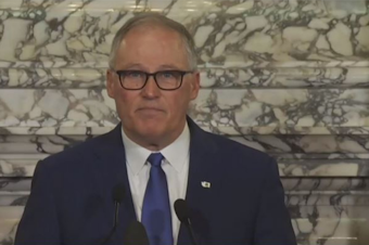 caption: Washington Governor Jay Inslee delivers his annual State of the State address on January 11, 2022.