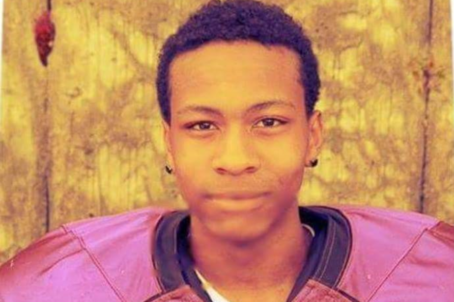 caption: Mi’Chance Dunlap-Gittens in a Garfield High School football jersey. 