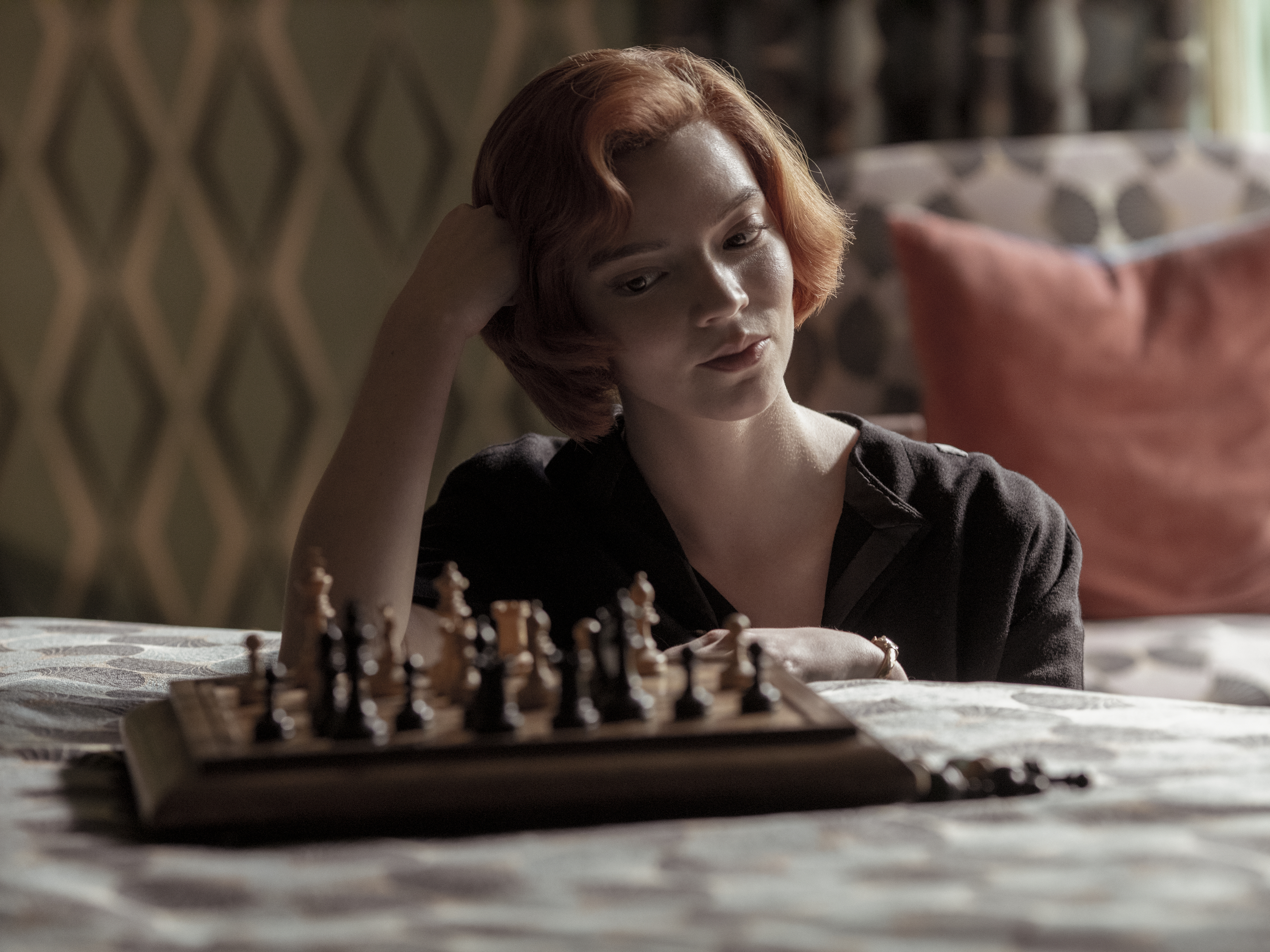 caption: Anya Taylor-Joy plays a swaggering chess prodigy in the new Netflix hit, <em>The Queen's Gambit.</em> It's success may lead to a shortage of chess sets this holiday season.