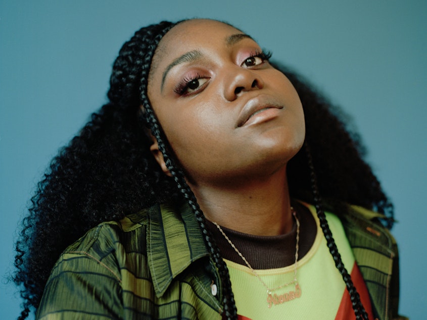 caption: Noted for its sharp commentary on race, identity, sex and politics, Noname's album, <em>Room 25,</em> was one of the most critically-acclaimed records of last year.