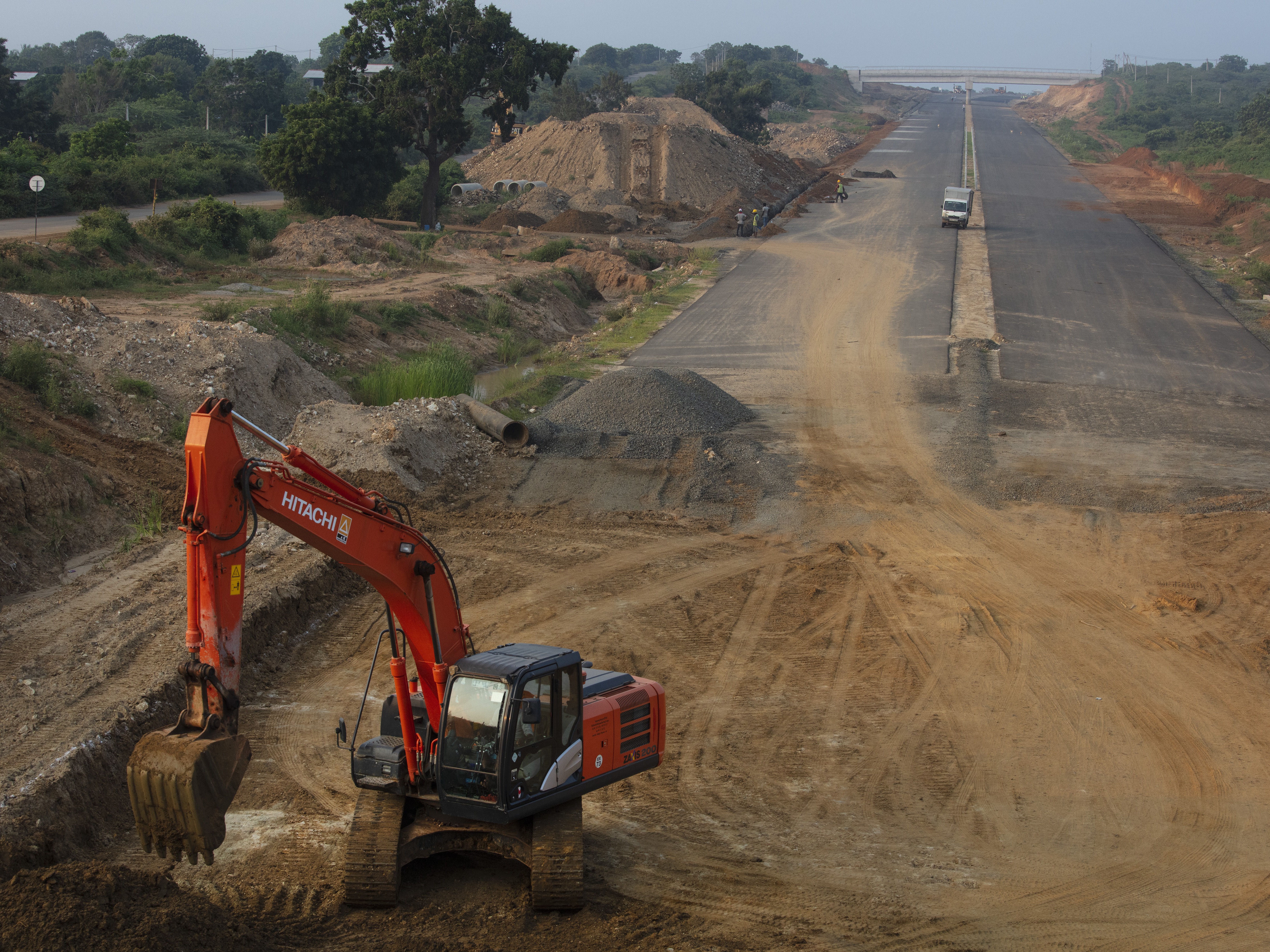 caption: The extension of the Southern Expressway from Matara to Hambantota shown near Hambantota, Sri Lanka, in 2018 — a major infrastructure project funded by China as part of Beijing's ambitious Belt and Road Initiative.
