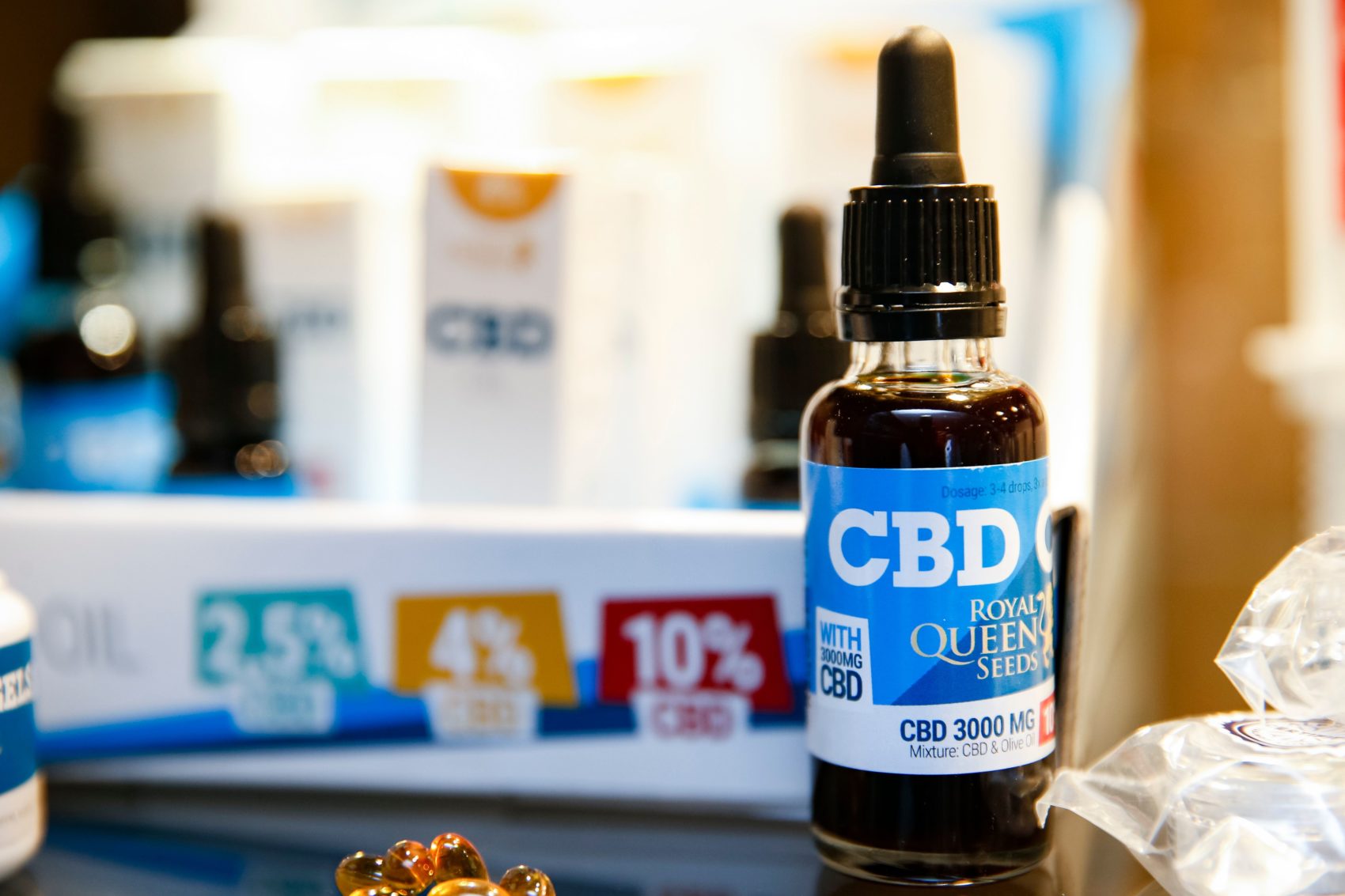 caption: Oils containing cannabidiol (CBD) are seen in a shop in Paris on June 14, 2018. (Geoffroy Van Der Hasselt/AFP/Getty Images)
