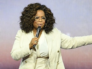 caption: Oprah Winfrey speaks during Oprah's 2020 Vision: Your Life in Focus Tour at Chase Center on February 22, 2020 in San Francisco, California.