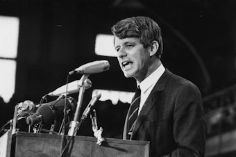 caption: Sen. Robert Kennedy speaks at an election rally in 1968.