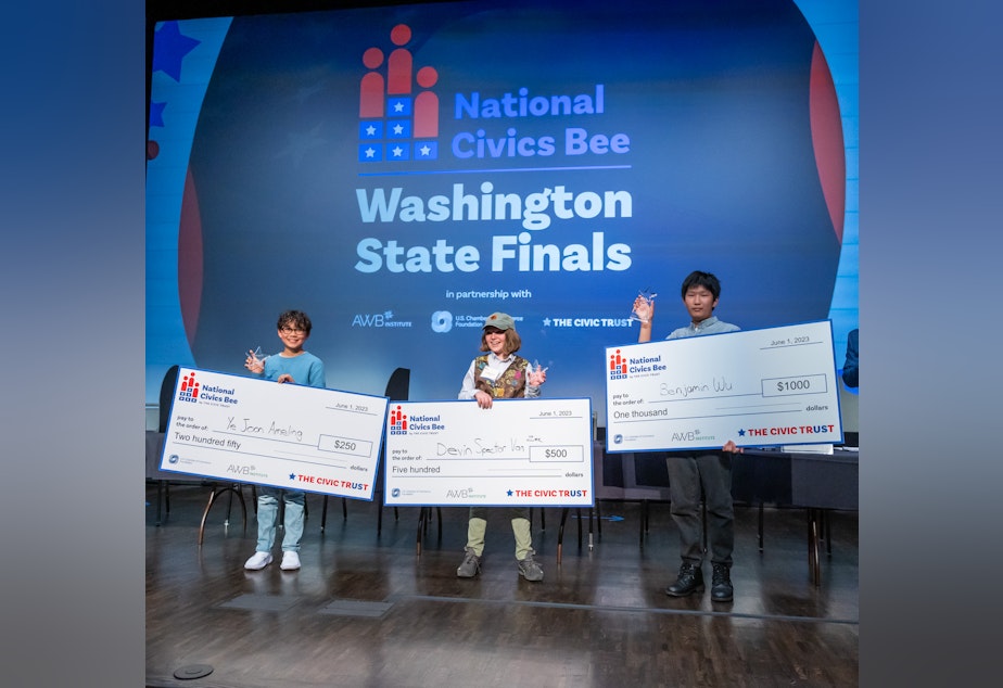 caption: The 2023 Washington Civics Bee finals were held at the Museum of Flight on Thursday, June 1, 2023. The winners were: first place, Benjamin Wu; second place, Devin Spector Van Zee; and third-place, Ye Joon Ameling. 