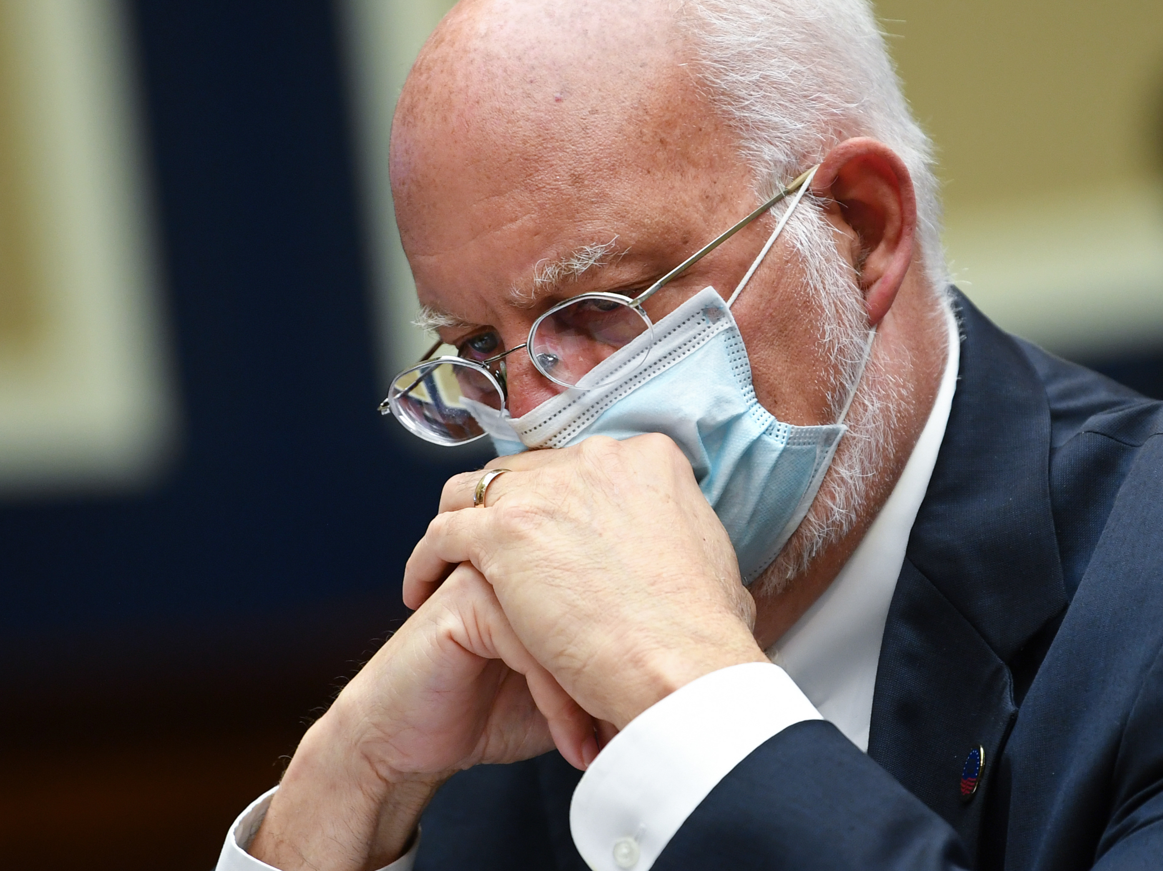 caption: "Our best estimate right now is that for every case that was reported, there actually were 10 other infections," Dr. Robert Redfield, director of the Centers for Disease Control and Prevention, said during a conference call Thursday. Redfield is pictured during a hearing of the House Committee on Energy and Commerce on Tuesday.