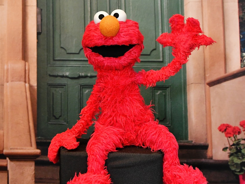 caption: <strong>Have a seat on my couch: </strong>When the beloved children's character Elmo asked how people how they were doing, the responses came from far beyond Sesame Street.