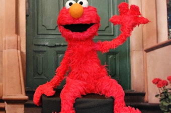 caption: <strong>Have a seat on my couch: </strong>When the beloved children's character Elmo asked how people how they were doing, the responses came from far beyond Sesame Street.