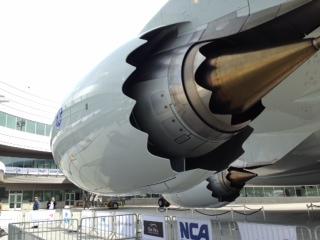 caption: A 787 waits for delivery at Boeing's Everett Delivery Center.