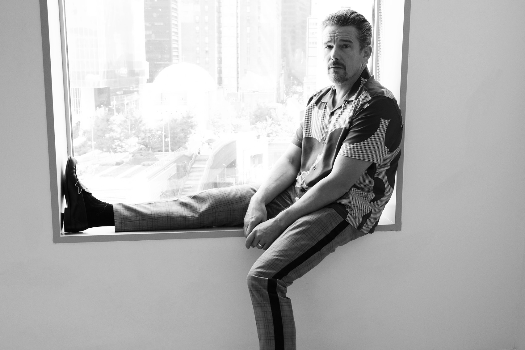 caption: In this Sept. 6, 2018 photo, actor-director Ethan Hawke poses for a portrait in New York to promote his film "Blaze." (Photo by Amy Sussman/Invision/AP)