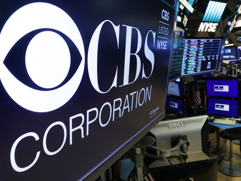 caption: CBS and Viacom said Tuesday they will reunite, bringing together their networks and the Paramount movie studio as traditional media giants bulk up to challenge streaming companies like Netflix.