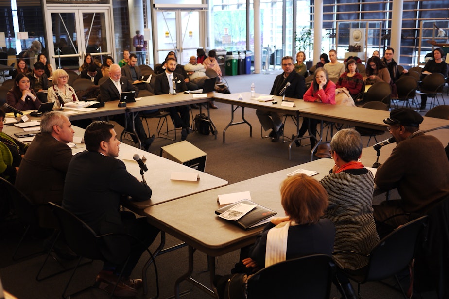 caption: Seattle City Council members hold roundtable discussion with immigrant and refugee service providers.