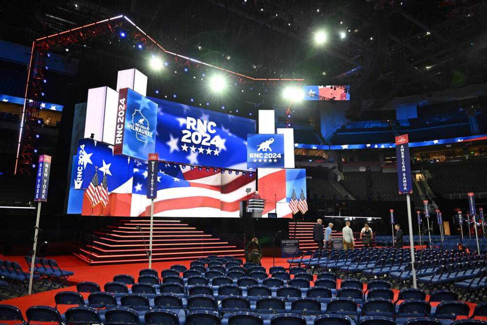 caption: A view of the convention floor and stage ahead of the 2024 Republican Convention. (Patrick T. Fallon/AFP via Getty Images)