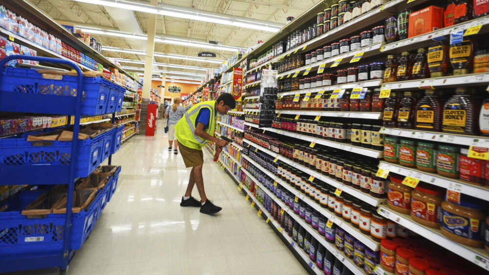 caption: A personal shopper gathers items to fill an online grocery order in Dallas, Thursday, Aug. 28, 2025. (AP Photo/LM Otero)