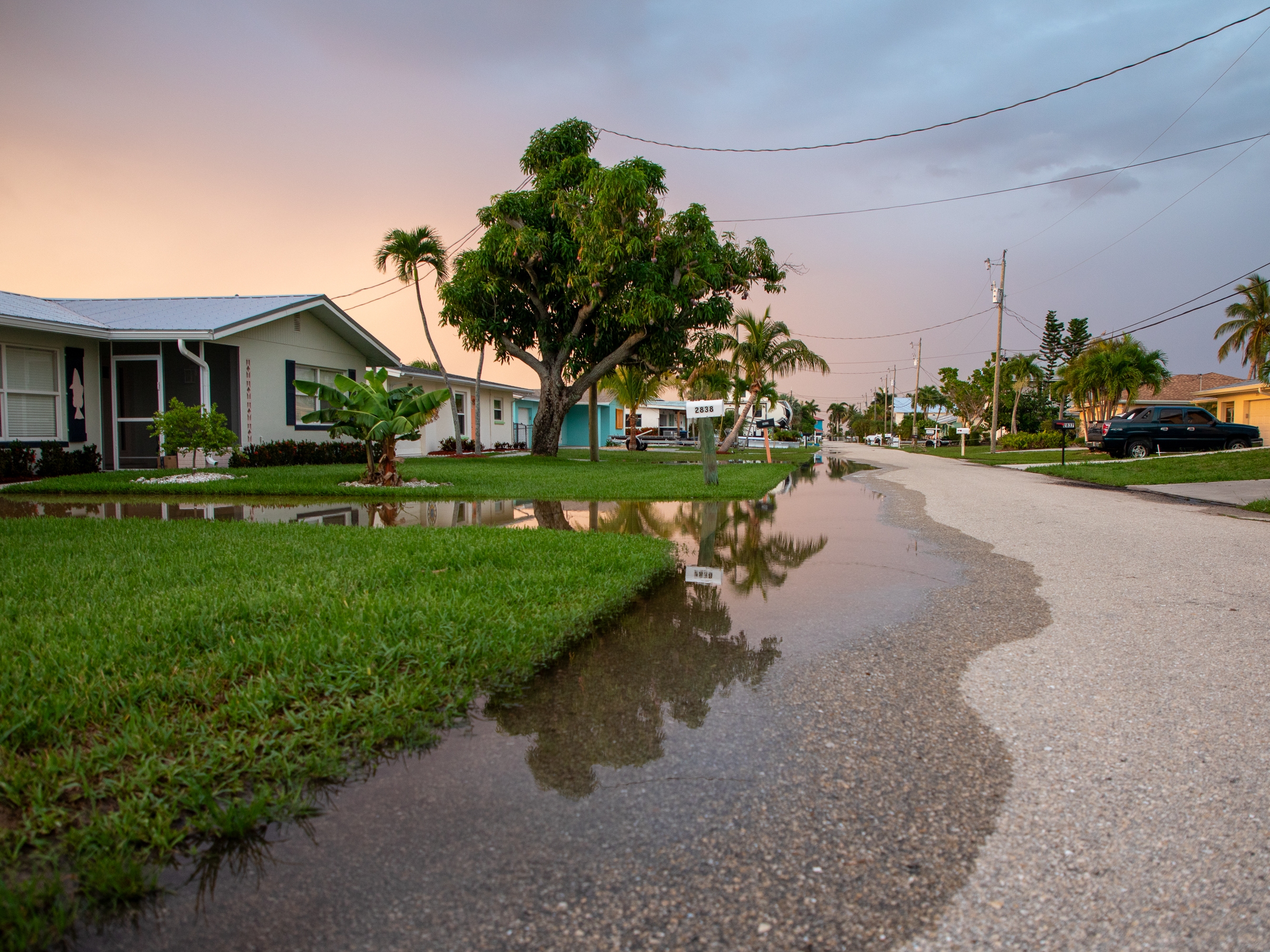 caption:  The island of Matlacha in Florida was devastated by Hurricane Ian in 2022. Many residents who rented homes were displaced, and are still suffering financially years later.