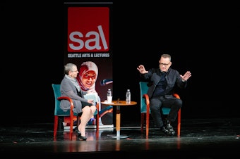 caption: Nancy Pearl and Tom Hanks on stage at McCaw Hall