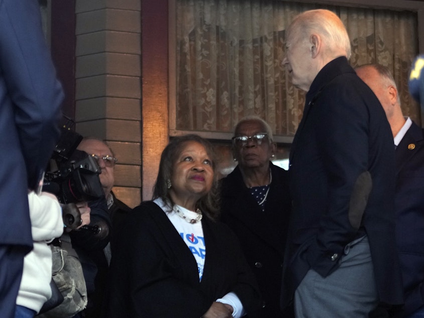 caption: President Biden talks with supporters during a campaign event in Saginaw, Mich., on March 14.