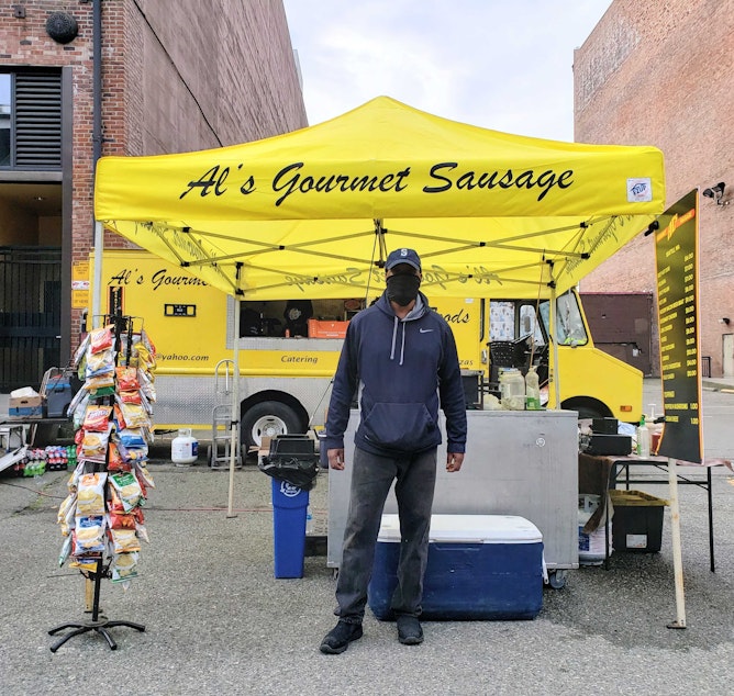 caption: Al Griffin sets up his hot dog stand for his 27th Opening Day. Not counting 2020, of course. Thursday, April 1, 2020