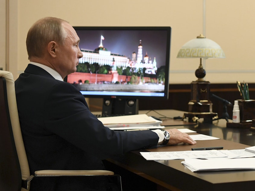 caption: Russian President Vladimir Putin addresses the nation in a televised address on Monday, May 11.