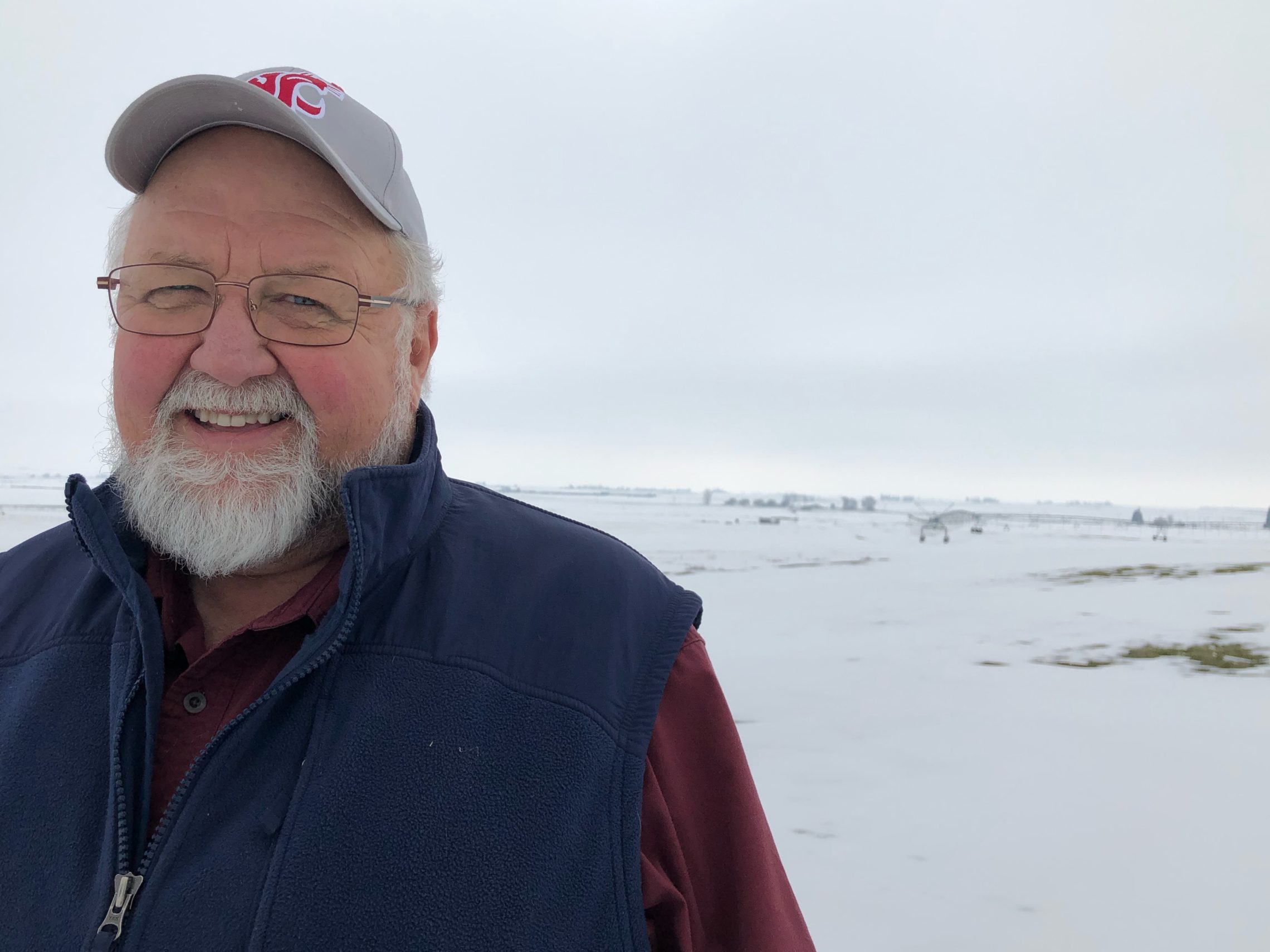 caption: Ed Schneider, 63, has grown french-fry-making spuds for 40 years outside of Pasco, Wash. He says in all his years of farming, he’s never seen planting be pushed this late. Most potato farmers have to dig on a contracted day to feed processors that run nearly year round.  CREDIT: ANNA KING/N3
