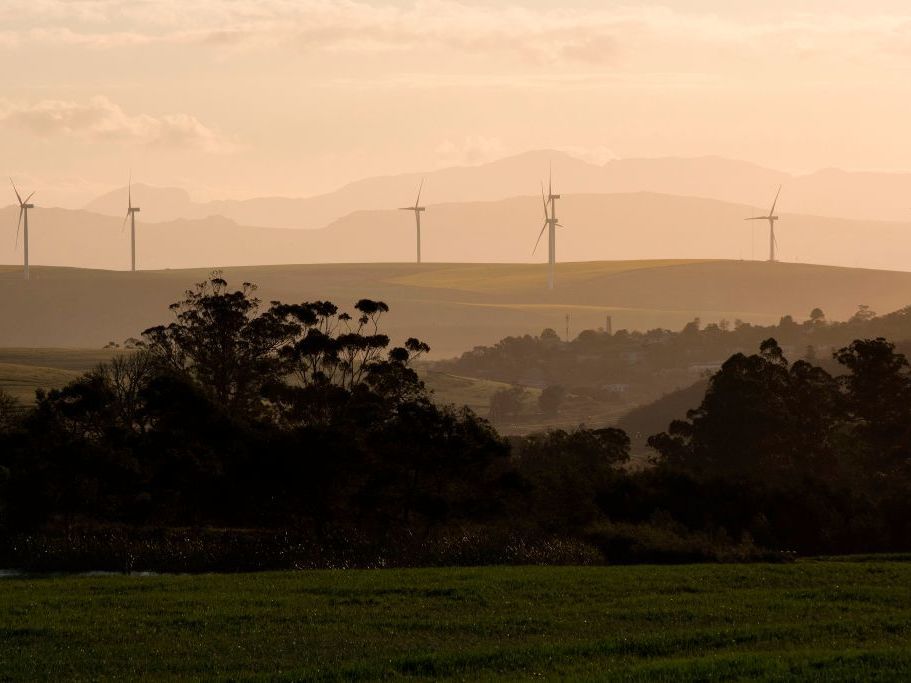 caption: At this year's U.N. climate conference, a major focus is boosting investment in developing countries. Experts say renewable energy projects like this wind farm in South Africa can be attractive to private investors.