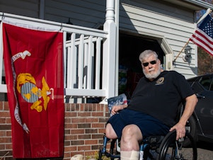 caption: Marine Corps veteran Ed O'Connor is seen outside his home in Fredericksburg, Va. He is among tens of thousands of veterans who took a COVID forbearance on a VA home loan. But the VA's program ended abruptly in October of 2022 and many veterans were asked to either pay all the missed payments or face foreclosure.
