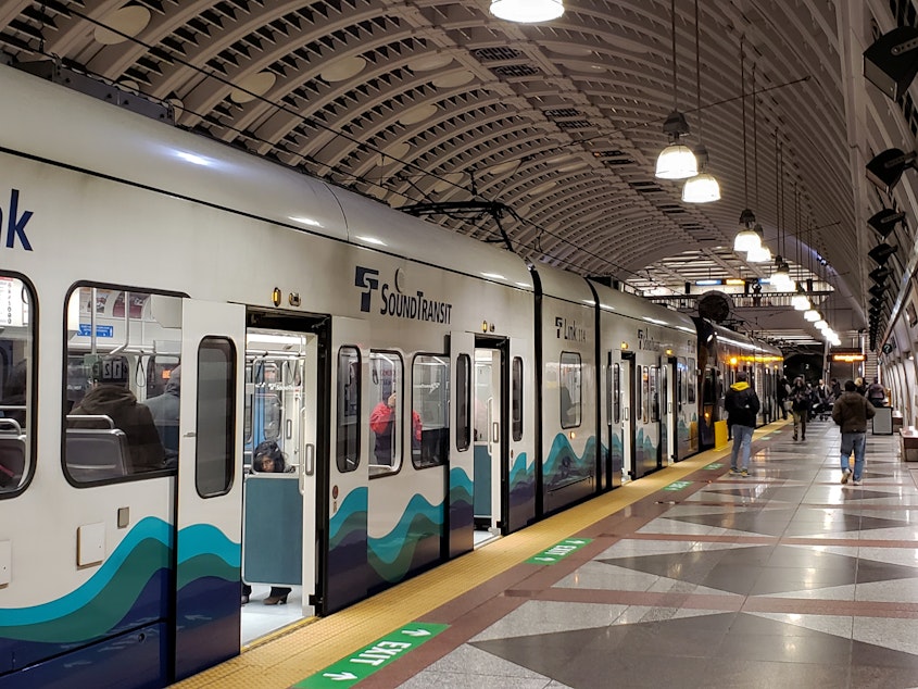 caption: A Sound Transit train in downtown Seattle, Thursday, January 2nd, 2020.