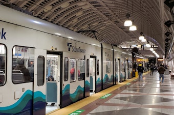 caption: A Sound Transit train in downtown Seattle, Thursday, January 2nd, 2020.