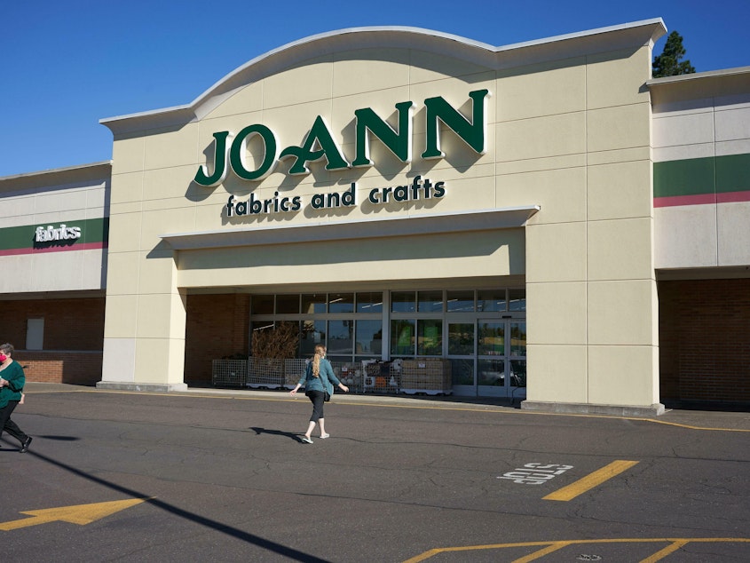 caption: A Joann store is seen in Tigard, Ore., in August 2020. The arts and crafts retailer announced Monday that it was filing for bankruptcy.