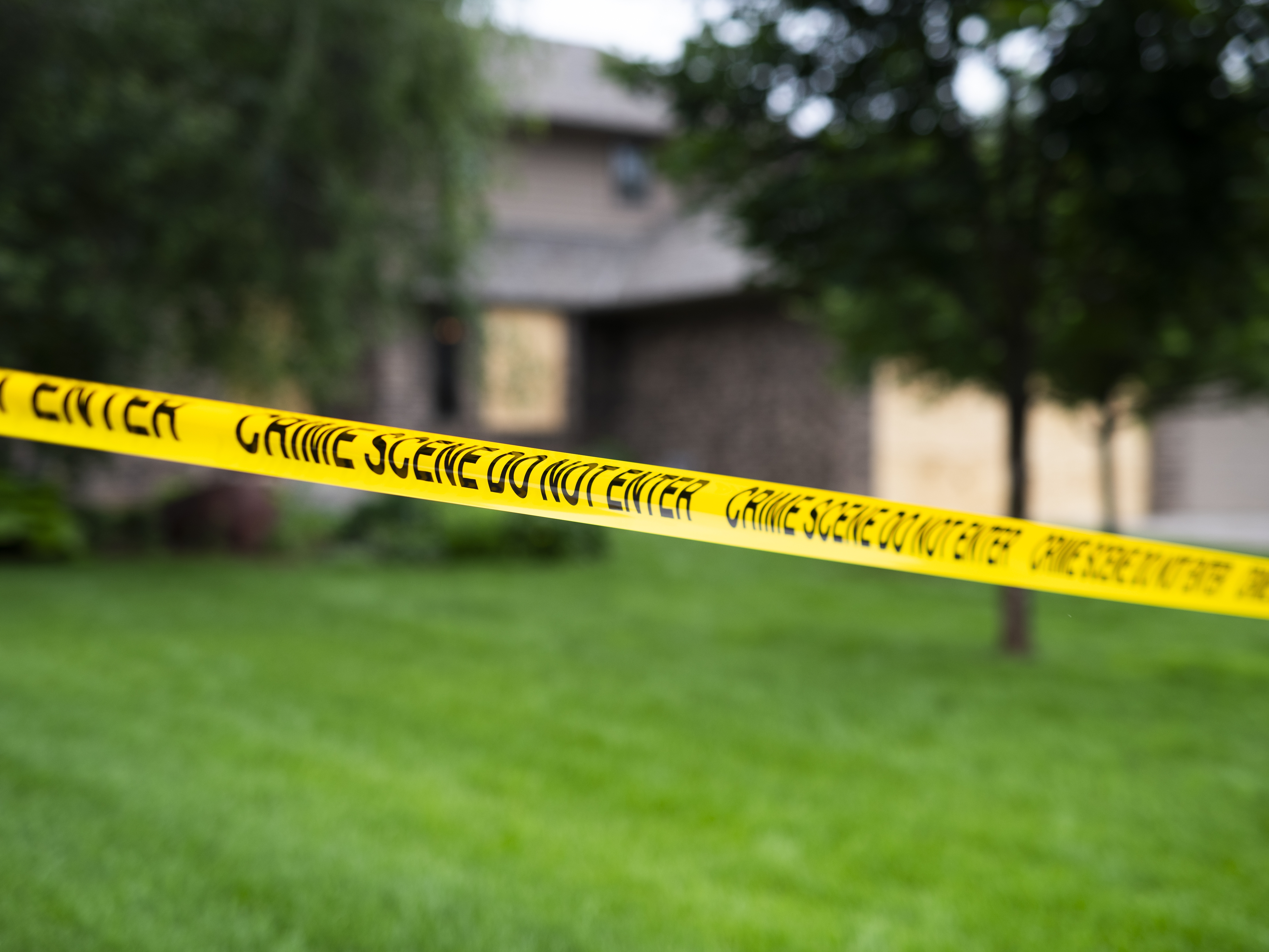 caption: Police tape is strung outside the home of State Rep. Melissa Hortman on June 15 in Brooklyn Park, Minn. Hortman and her husband, Mark Hortman, were shot and killed this month in what officials are describing as a political assassination.