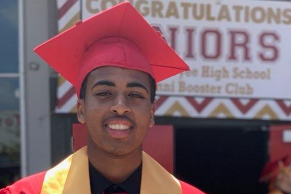 caption: Ahmed Ahmed at his graduation from Tyee High School in 2019. He is now a student at Highline College.