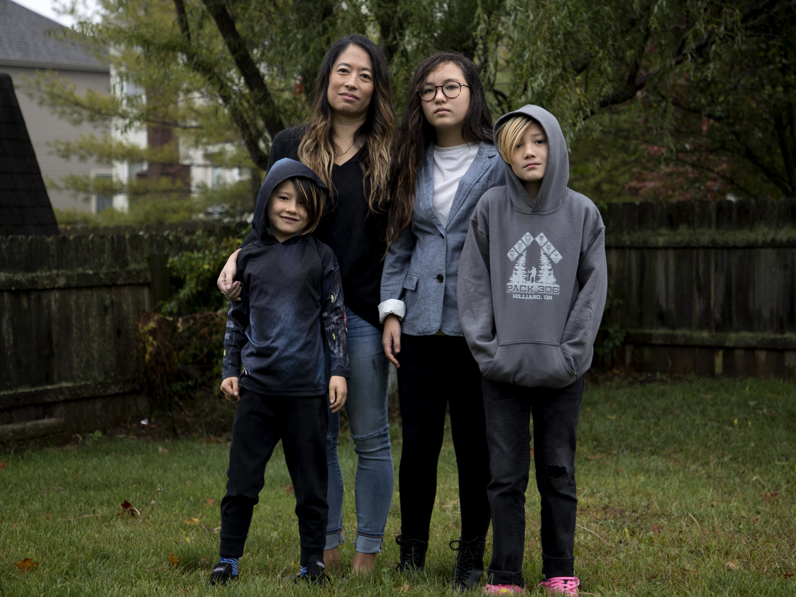 caption: Joyce Chen and her children Campbell, 7, Bryn, 12, and Emerson, 10.