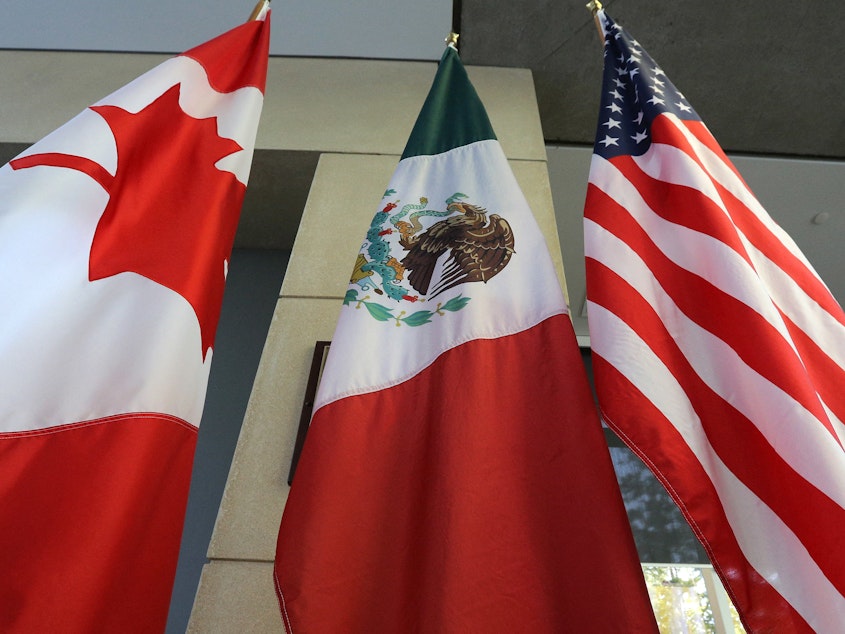 The Mexican, U.S. and the Canadian flags.