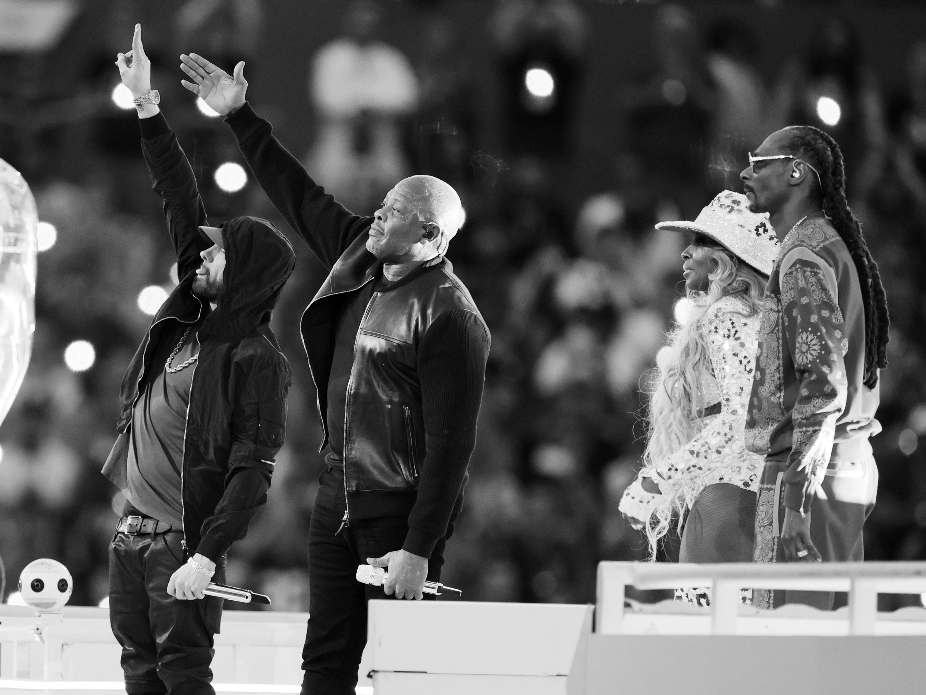caption: Halftime show performers Eminem, Dr. Dre, Mary J. Blige and Snoop Dog at the Super Bowl 56.