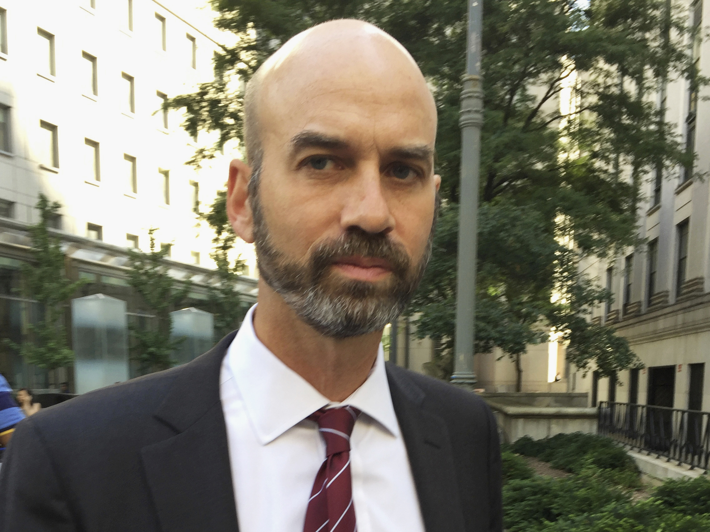 caption: Former <em>New York Times</em> editorial page editor James Bennet, shown here in a photo from 2017, said Tuesday he accepted blame for an editorial that falsely linked a graphic from former Gov. Sarah Palin's political action committee with a mass shooting in Arizona. He testified during Palin's defamation suit.