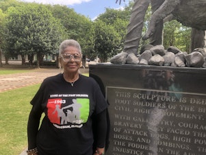 caption: Foot soldier Paulette Roby stands in Birmingham's Kelly Ingram Park, one of the sites where students peacefully marched in the Spring of 1963 demanding equal rights.