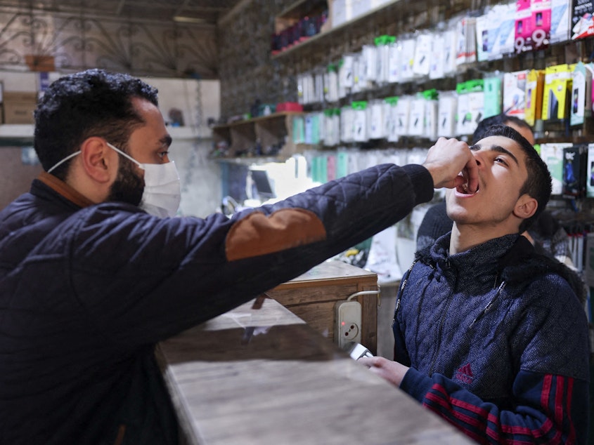 caption: Syrian medics launched a vaccination campaign in the northwestern Idlib province in early 2023. Such campaigns depend on the global cholera vaccine stockpile, which is currently empty.