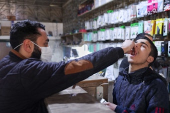 caption: Syrian medics launched a vaccination campaign in the northwestern Idlib province in early 2023. Such campaigns depend on the global cholera vaccine stockpile, which is currently empty.