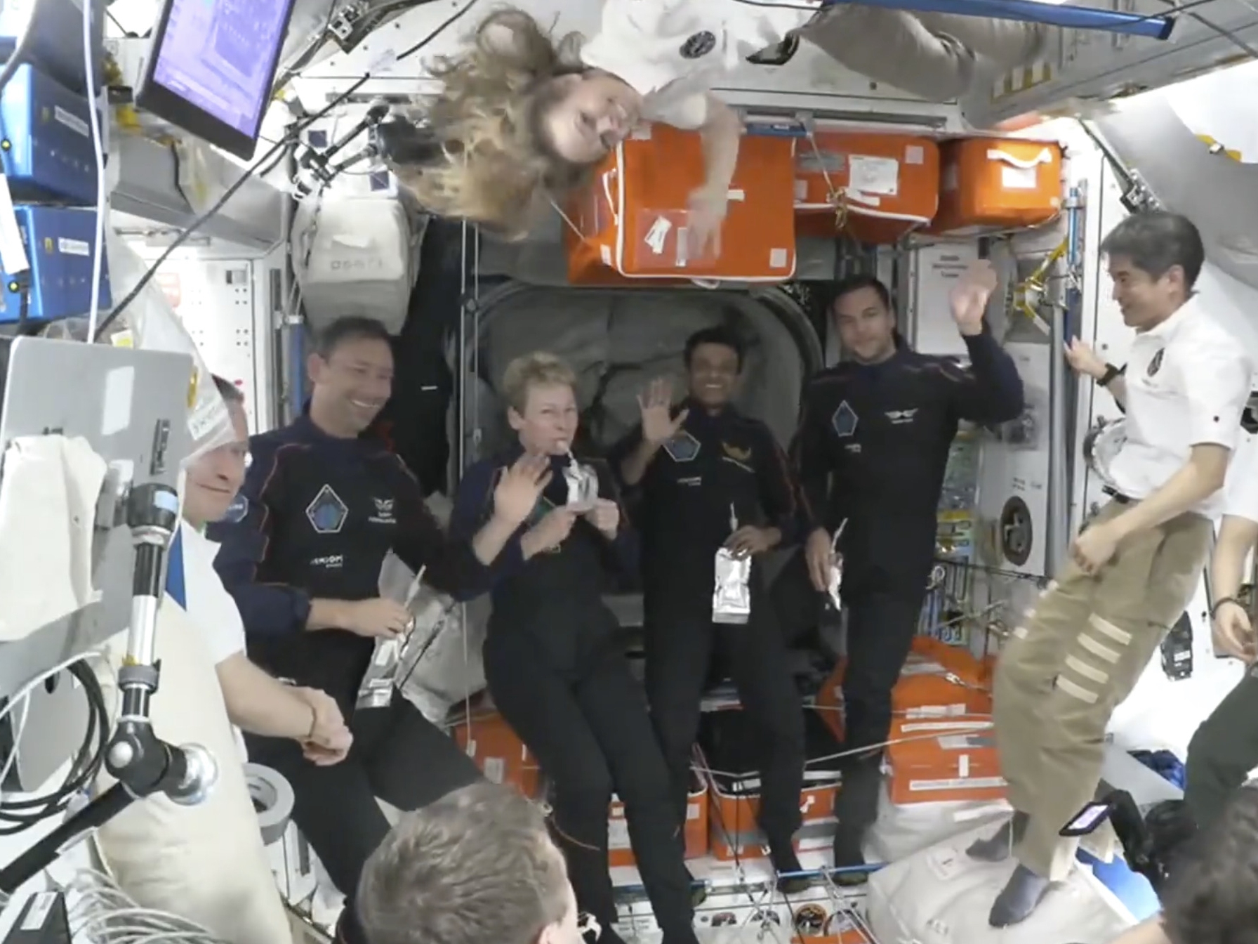caption: This image provided by NASA shows Axiom Space crew members from the Ax-4 mission from second left, Poland's Slawosz Uznanski-Wisniewski, Axiom Space's Peggy Whitson, India's Shubhanshu Shukla and Hungary's Tibor Kapu aboard the International Space Station, on June 26, 2025.