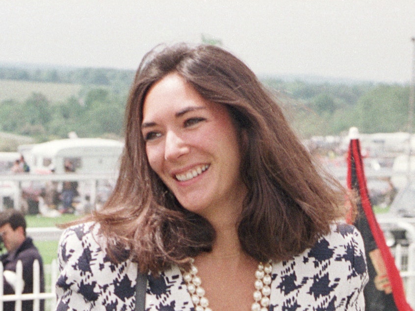 caption: A 1991 photo of British socialite Ghislaine Maxwell, Jeffrey Epstein's former girlfriend who now faces multiple counts of sex trafficking.