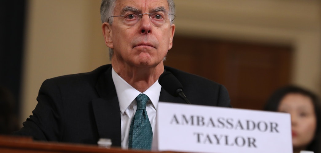 Top U.S. diplomat in Ukraine William Taylor waits to testify before the House Intelligence Committee on Wednesday.